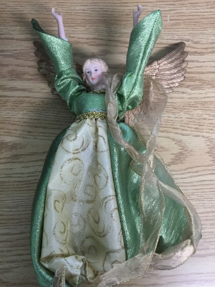 Photograph of tacky ornamental angel.